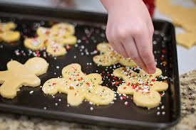 sprinkles being added to cookies